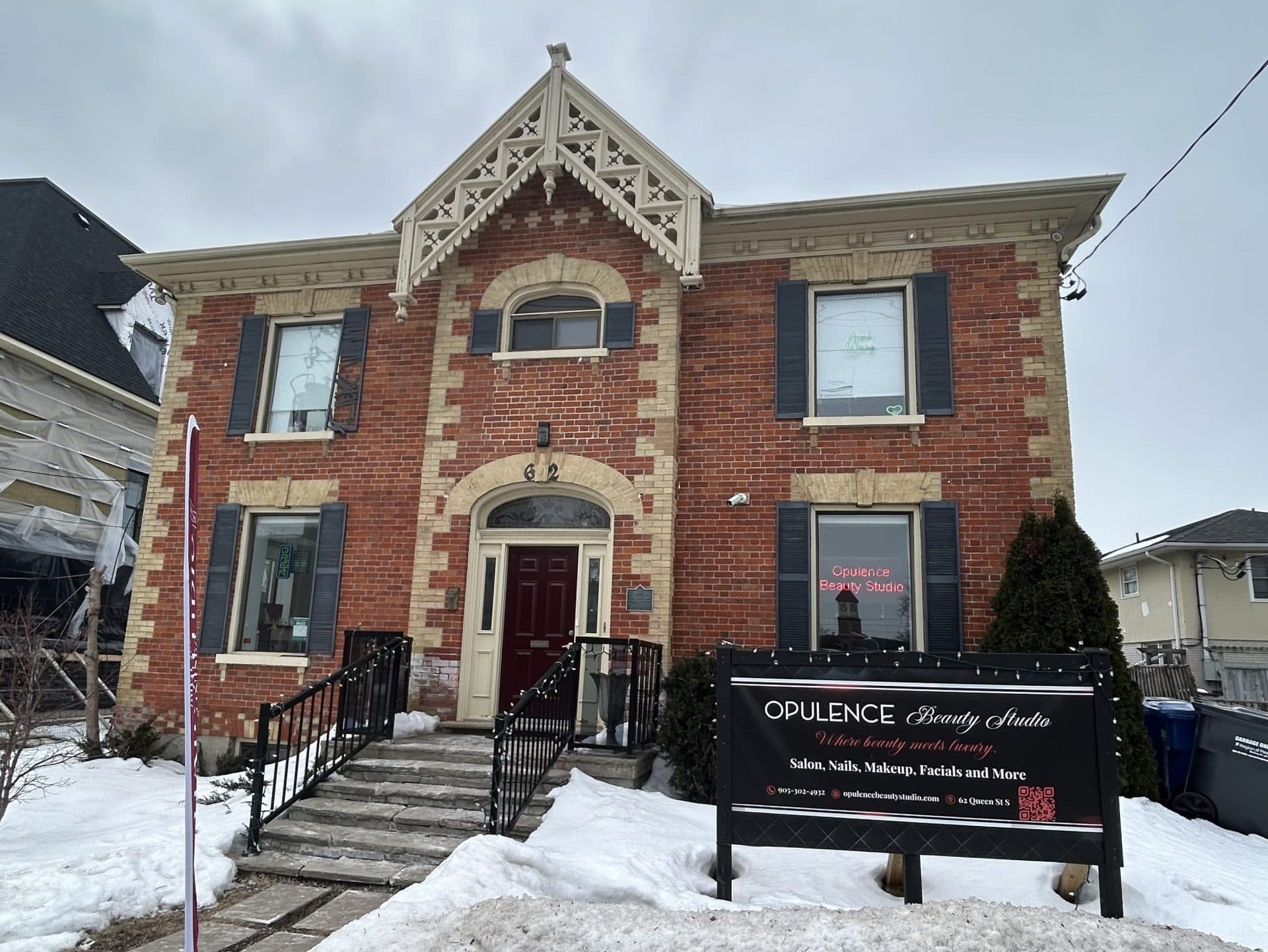 The storefront of Aroma Waxing and Laser Clinic (Streetsville location) with hours of operation, address, phone number, and email below