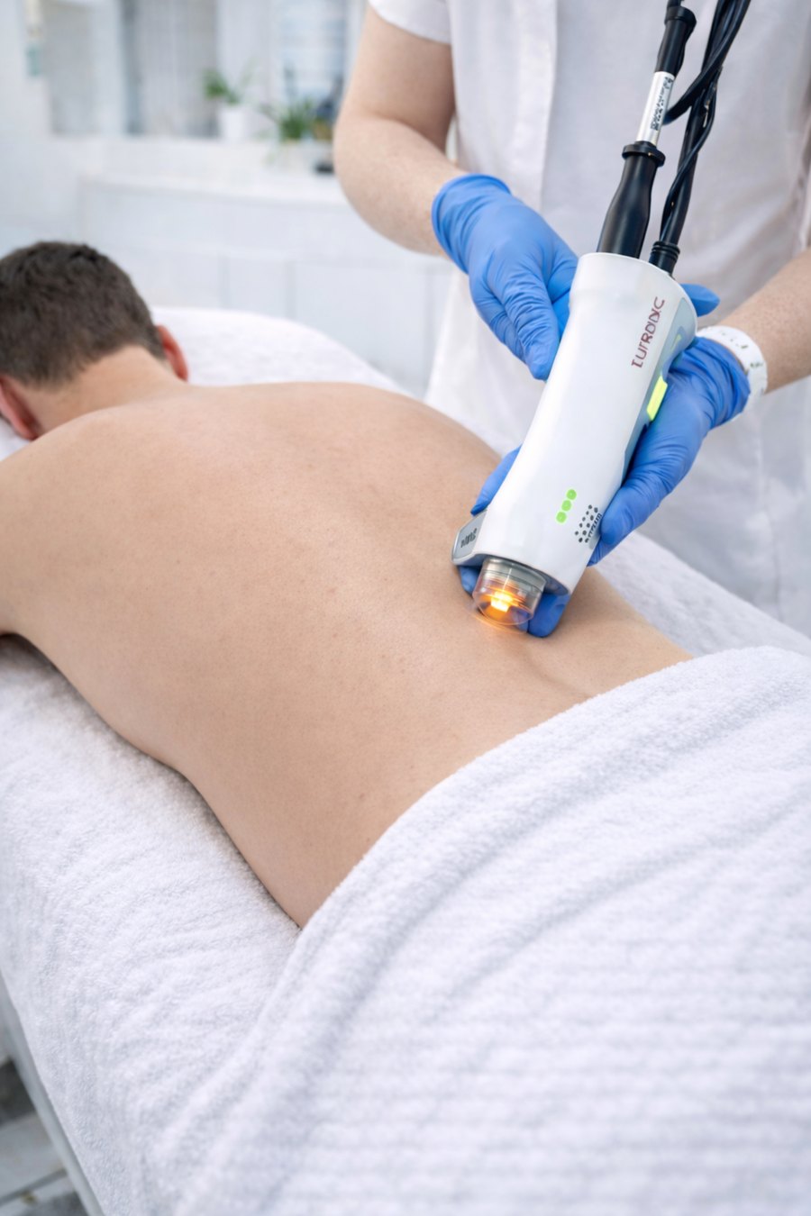 Back laser hair removal treatment in progress at Aroma Waxing & Laser Clinic